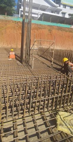 Lift pit beam reinforcement